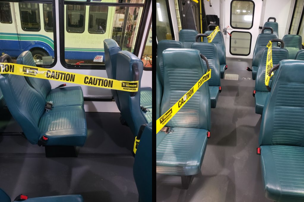 Buses with taped seats to ensure distance between passengers during COVID-19 emergency